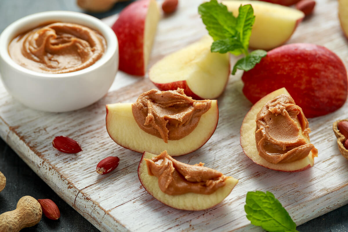 High protein low carb snacks: sliced apples with peanut butter