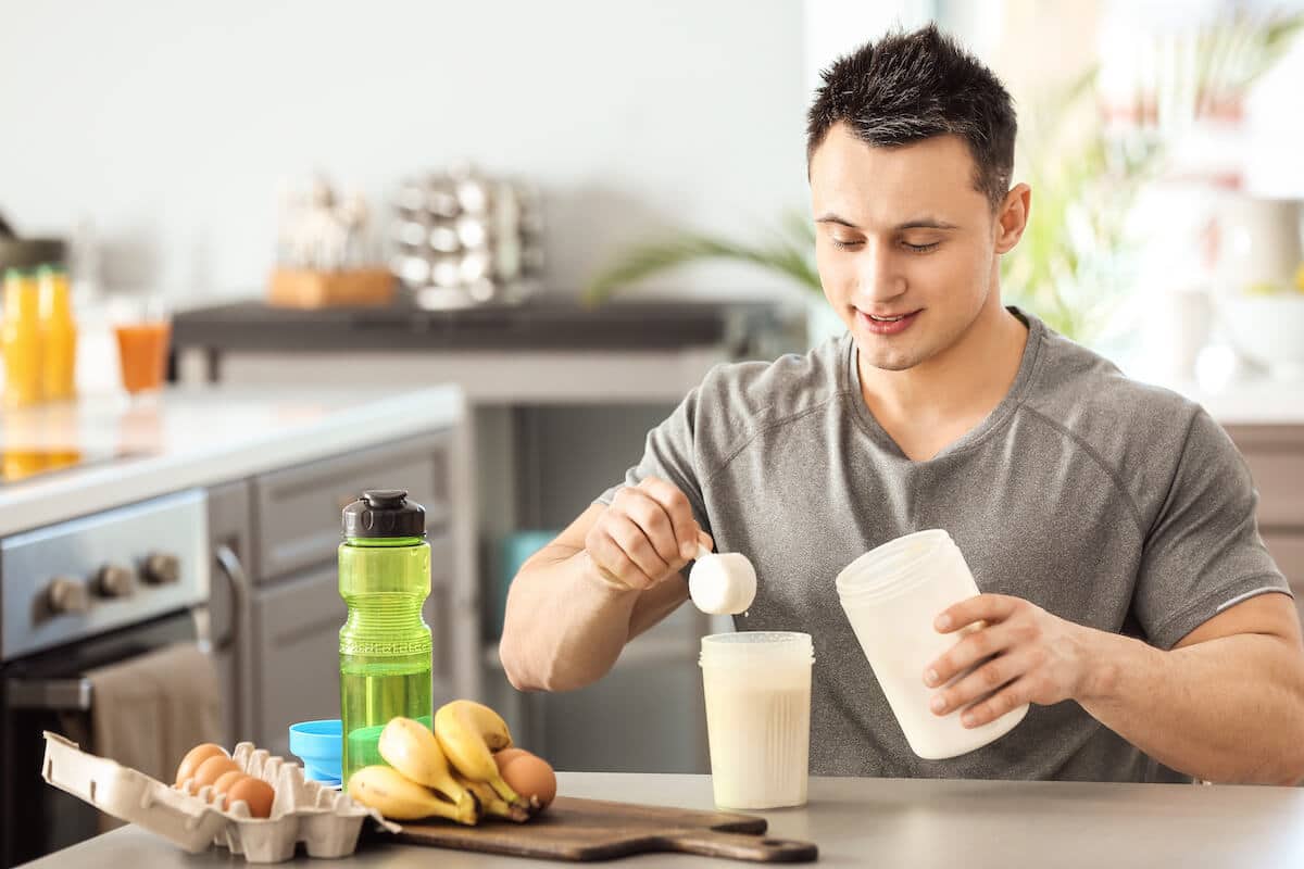 Man preparing a protein shake