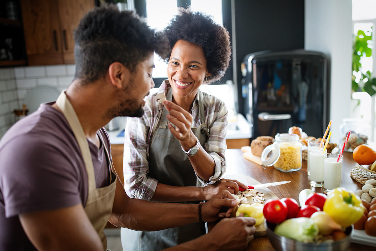 High protein low carb meals: couple preparing their food