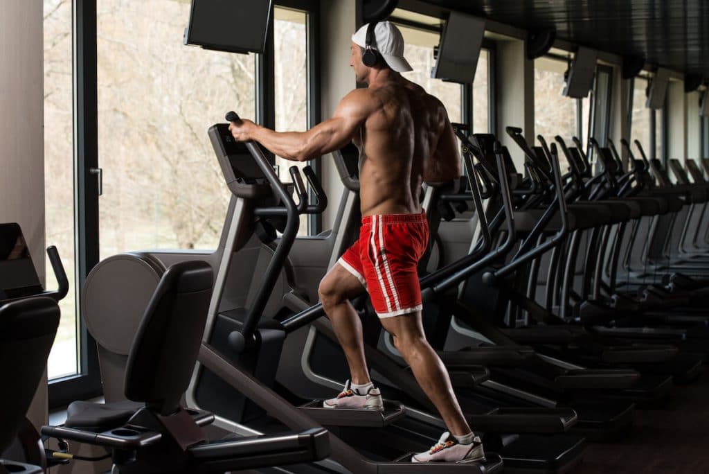 Man using a stair climber machine