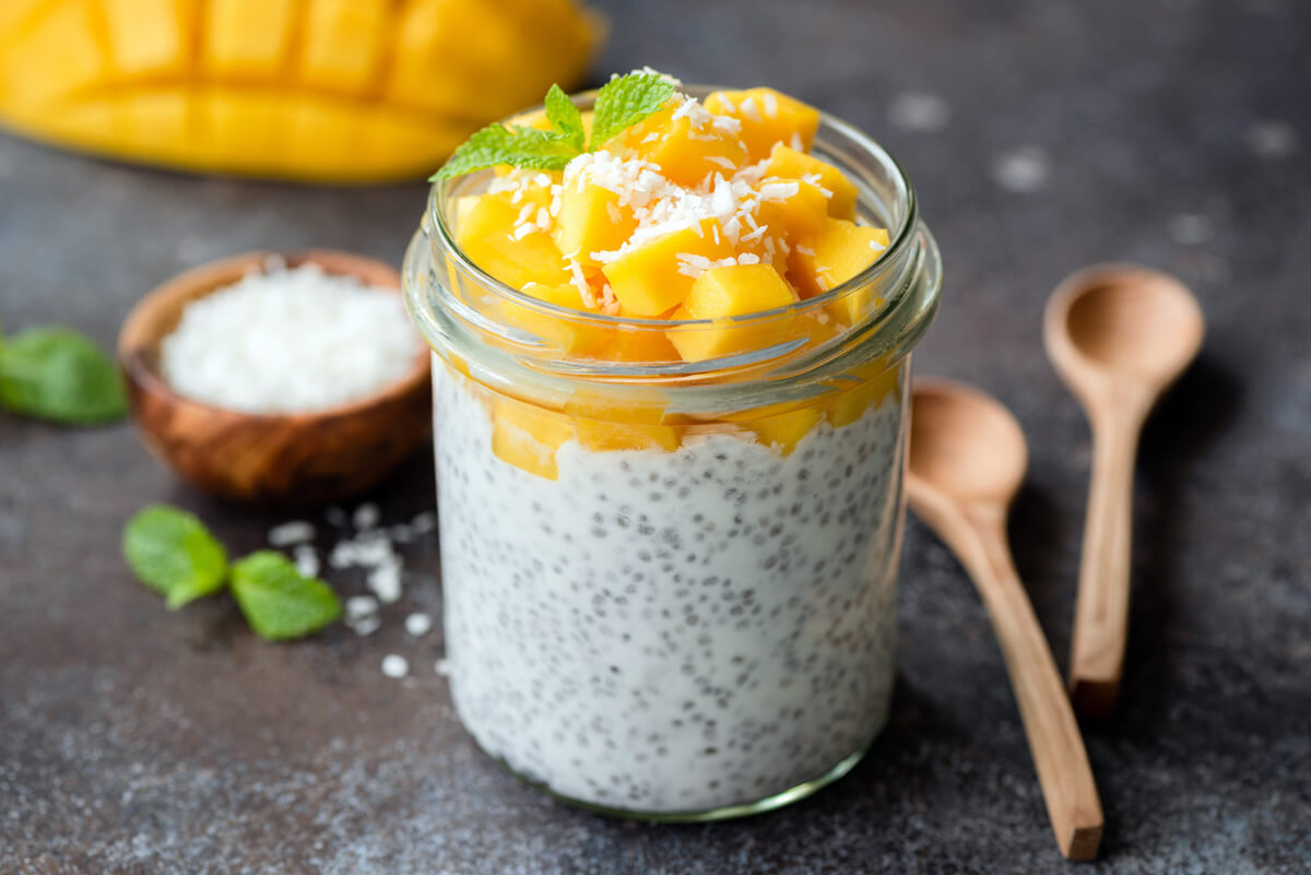 Chia coconut pudding with mangoes in a jar