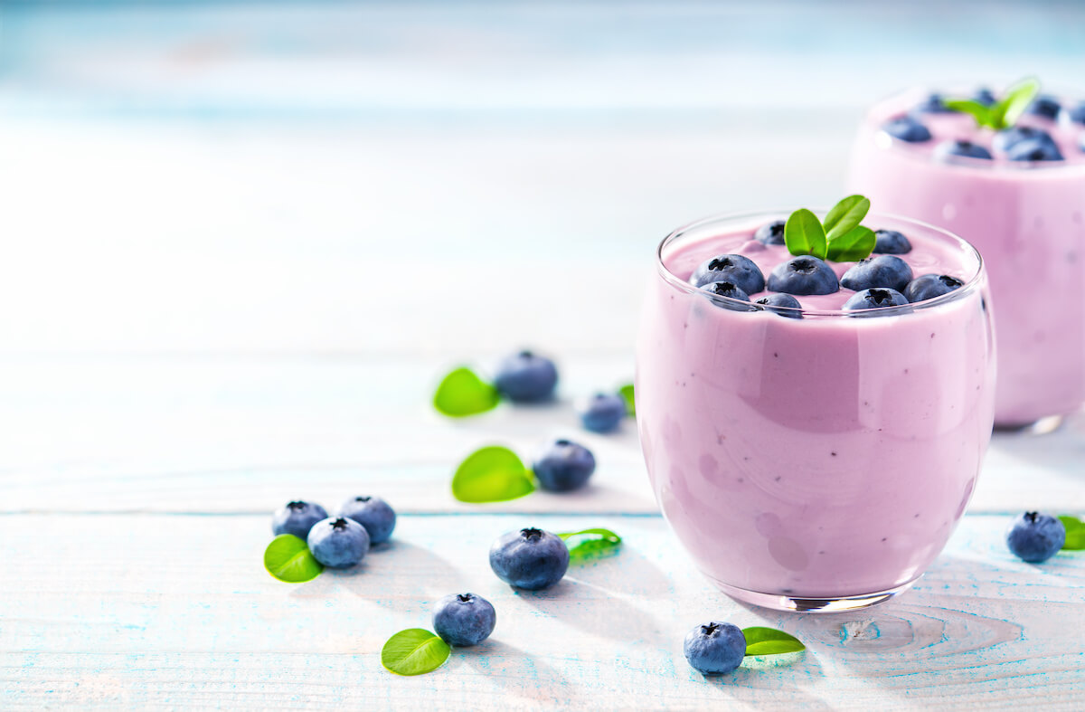 Two glasses of blueberry smoothie