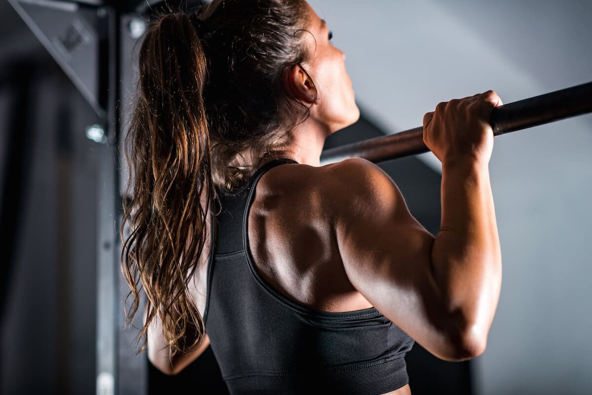 Woman doing pull-ups