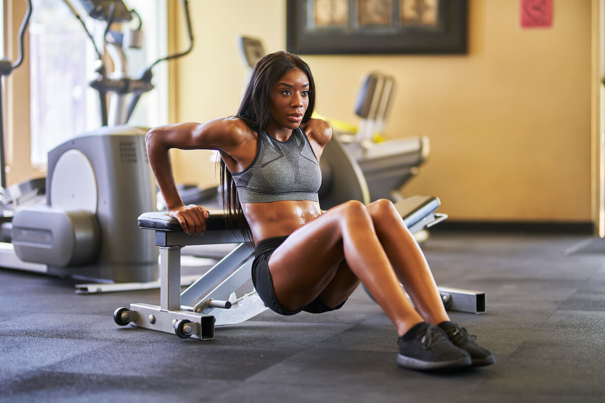 How often should you workout: woman working out at a gym