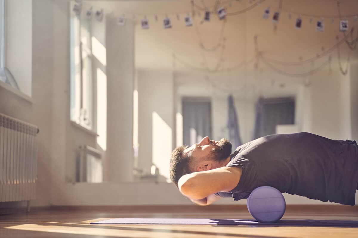 Man using a foam roller