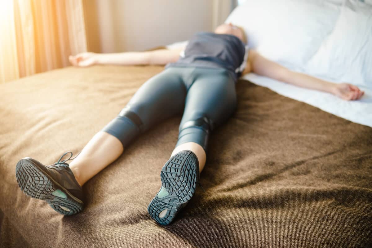 Muscle recovery: person lying on a bed